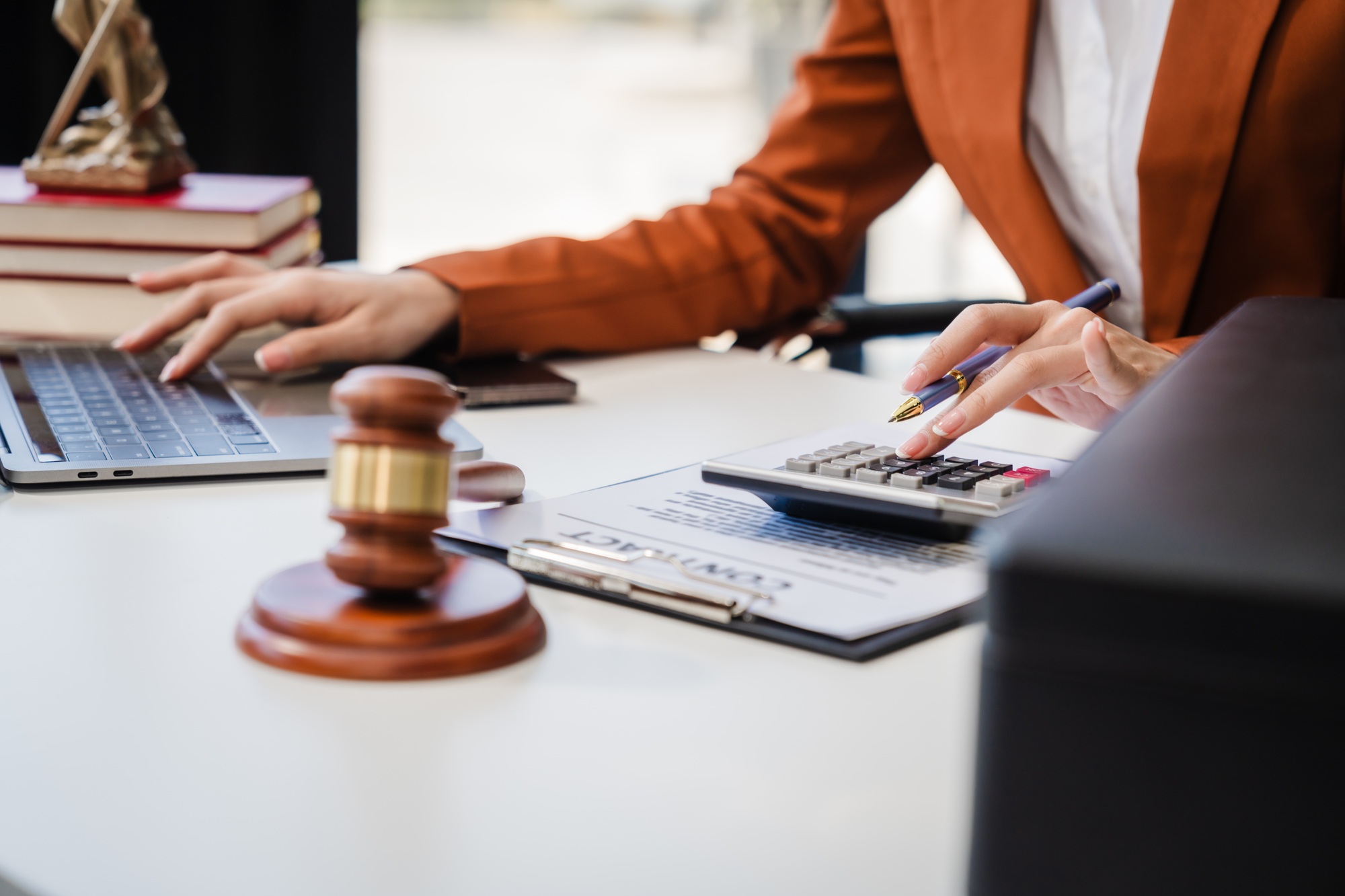 In Asian legal compliance, faculty of law, legal counseling office,female lawyer reads contract